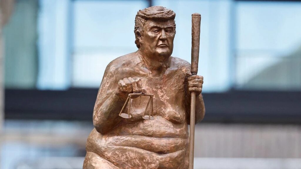 golden Trump statue European Parliament, naked Trump statue Strasbourg, Jens Galschiøt sculpture, King of Injustice statue, Per Clausen MEP exhibition, European Parliament art display, orange plague statue, golden trump statue, european parliament, strasbourg, jens galschiot, king of injustice, political satire, per clausen, cop30, world news, europe,
